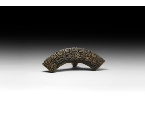 1st millennium AD. A ceramic pottery stamp with lug handles, arched panel with outer tier of rosettes and inner tier of quadr