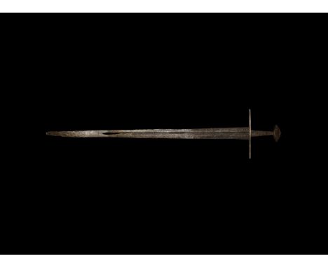 Mid 10th-mid 11th century AD. An elegant, finely tapering blade with well-formed fullers, running down to within 23cm of the 