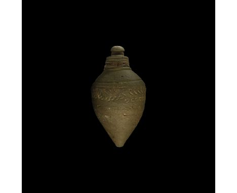 9th-11th century AD. A hollow ceramic vessel with conical body, intended to be filled with explosive liquid and a wick, and u