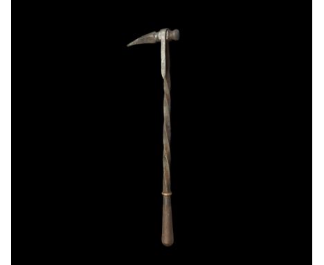 16th-17th century AD. A war hammer or Nazdiak of Polish origin, the head composed of two pieces; the twisted shaft made of so