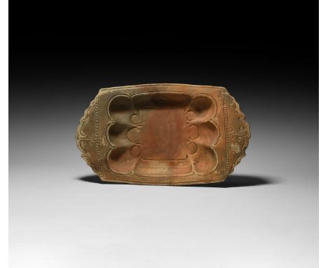 2nd-4th century AD. A rare, beautiful, rectangular-shaped redware platter (lanx) with scalloped edges to the short sides; the