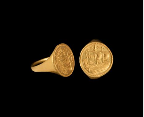 16th-17th century AD. A gold finger ring with large disc bezel, beaded border with intaglio two-masted galleon under sail wit