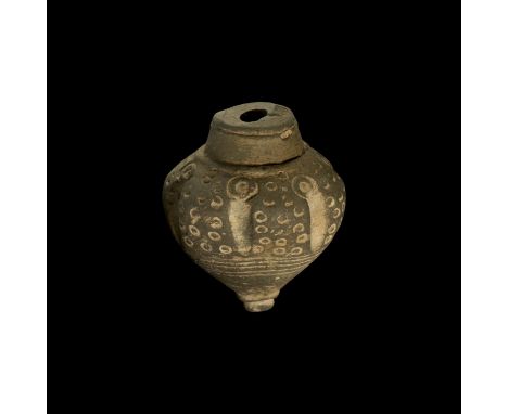 9th-11th century AD. A hollow ceramic vessel with conical body, intended to be filled with explosive liquid and a wick, and u