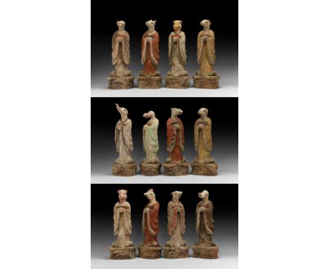 Tang Dynasty, 618-906 AD. An important set of twelve painted shengxiao ceramic zodiac figures, each a cloaked human body stan