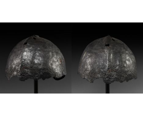 11th-12th century AD. A Western European iron conical helmet of Norman or German origin, with one-piece bowl, the fairly low 