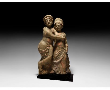 3rd century BC. A hollow-formed ceramic figurine of Canosa type, depicting two embracing figures, probably a statue of the ro