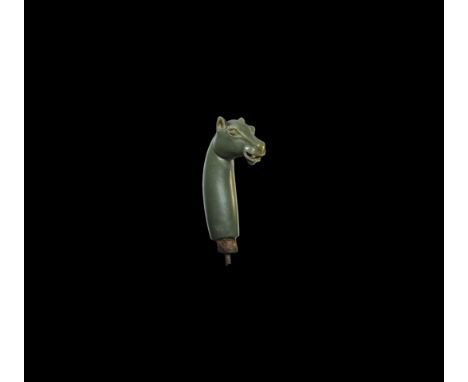 18th-19th century AD. A carved jade grip from a kard dagger with tiger-head(?) finial, pricked ears and slightly open mouth e