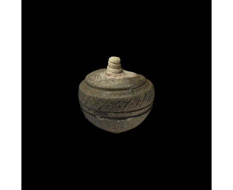 9th-11th century AD. A hollow ceramic vessel with conical body, intended to be filled with explosive liquid and a wick, and u