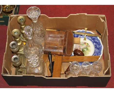 A box of miscellaneous items to include a turned ebony gavel, a stonemason's mallet, pair of brass candlesticks, cut glass de