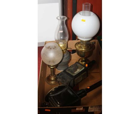 A box of miscellaneous items to include brass pedestal oil lamp with opalescent globular shade, carriage lantern etc