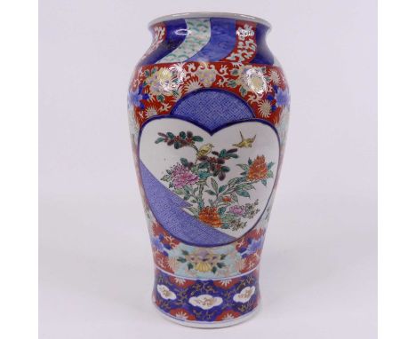 A Japanese Imari pattern vase of inverse baluster form, enamel decorated with birds and flowers, bearing a six character mark