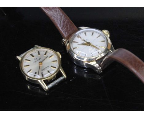 A lady's Omega Seamaster gold plated and steel cased manual wind wristwatch, case dia.21mm; together with a lady's Omega Gene