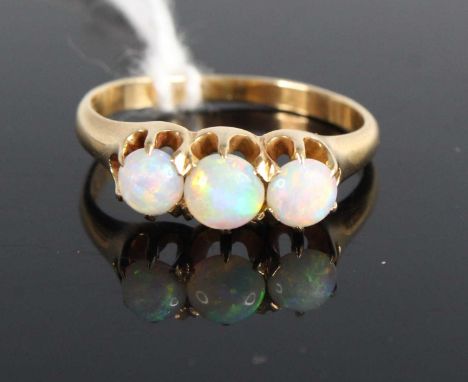 A 14ct gold and opal three-stone ring, 3g, size M 