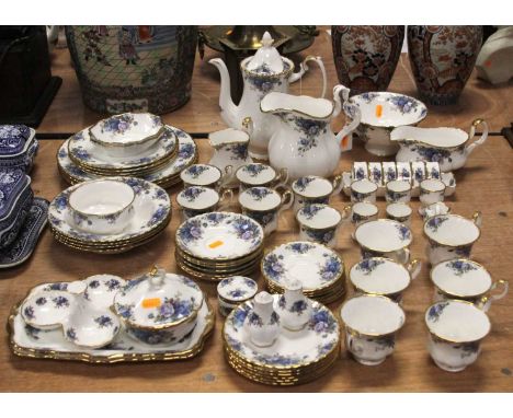 An extensive collection of Royal Albert table wares in the Moonlight Rose pattern, having printed mark verso, to include teap