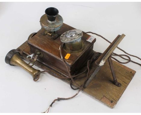 A vintage wall mounted rotary telephone (a/f)