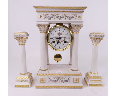 A Franklin Mint neo-classical style matt porcelain three-piece clock garniture, height 36cm 