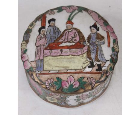 A Chinese Canton porcelain table box and cover, of squat cylindrical shape, the lid enamel decorated with figures before an a