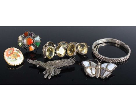 Assorted costume jewellery to include a silver hinged bangle, enamelled badges, marcasite brooch, 8ct gold and amethyst set p