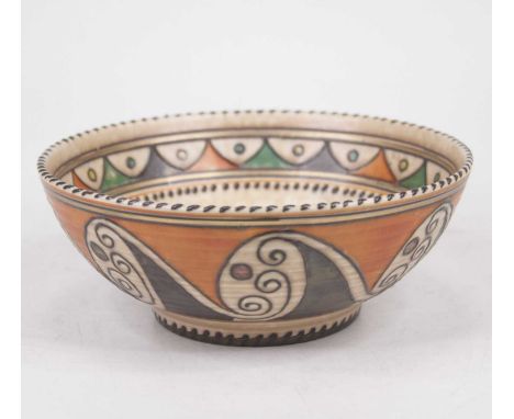Charlotte Rhead for Crown Ducal - a pottery bowl, tube-line decorated in the Arabian Scroll pattern, No.4926, having printed 