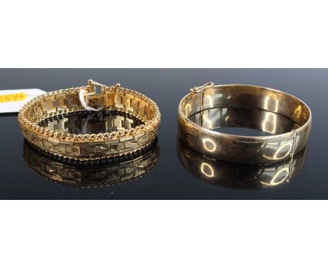 A 9ct gold and loaded hinged bangle, w.63mm; together with a bright cut gold plated sectional bracelet (2)