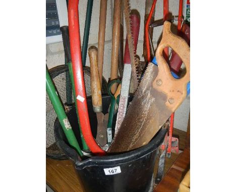 A quantity of garden tools.