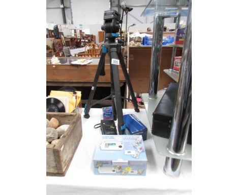 A camera tripod and 4 camera's including Olympus, Vivitar etc.,