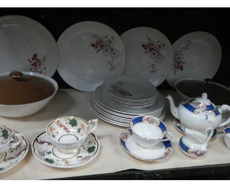 A dinner set, a tea for 2 set and 2 tea cups and saucers.