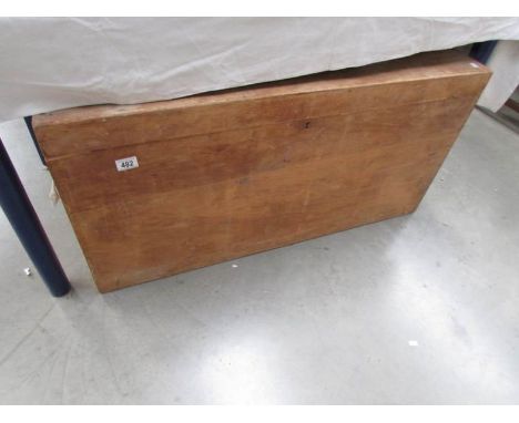 A large wooden trunk.