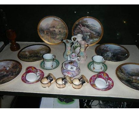 A shelf of miscellaneous ceramics including collector's plates.