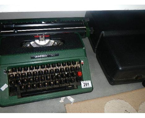 A Silver Reed typewriter.