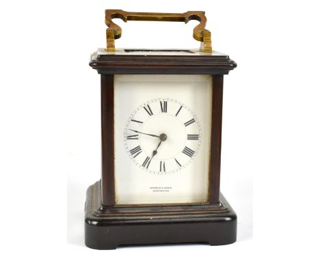 ARNOLD &amp; LEWIS; an mahogany cased carriage clock, with broken swan neck folding handle above the dial set with Roman nume