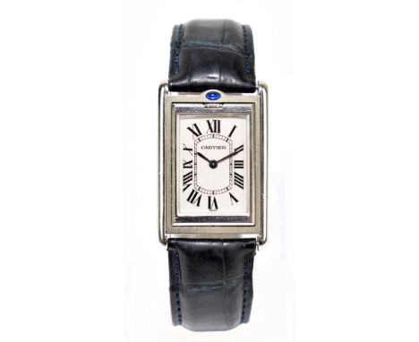 CARTIER; a stainless steel Cartier Tank Basculante wristwatch circa 1990 with white face and original navy blue leather Carti