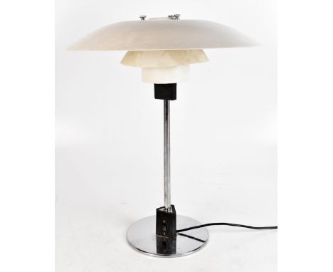 LOUIS POULSEN; a Danish chrome and white metal table lamp, with original label to the underside numbered 27094, height 54cm.A