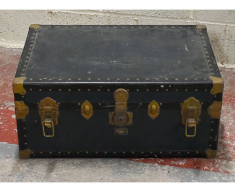 A vintage school trunk with internal tray, with a selection of pewter items, blow torches and a yoke (Qty)