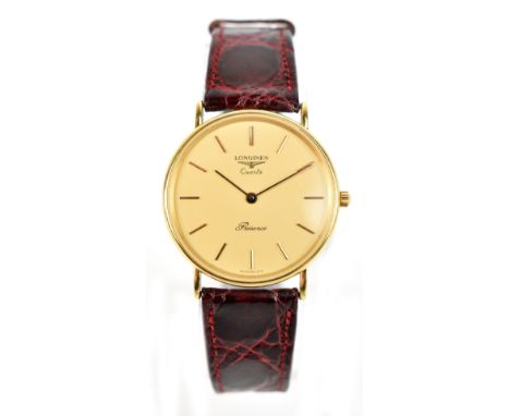 LONGINES; a 9ct yellow gold quartz 'Présence' wristwatch, case numbered 25.188.136, diameter excluding winding crown 32mm, in