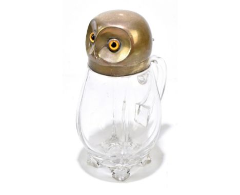 WILLIAM HUTTON &amp; SONS LTD; a Victorian hallmarked silver and clear glass novelty decanter modelled as an owl, with amber 