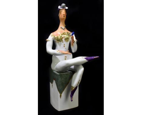 MEISSEN; a 20th century abstract figure modelled as a lady seated upon a column, designed by Silvia Klöde, painted marks to b