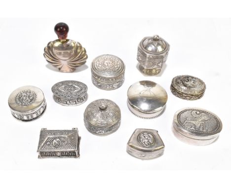 Ten Continental white metal miniature boxes and covers, the tallest height 5cm, and a Continental white metal scent bottle wi