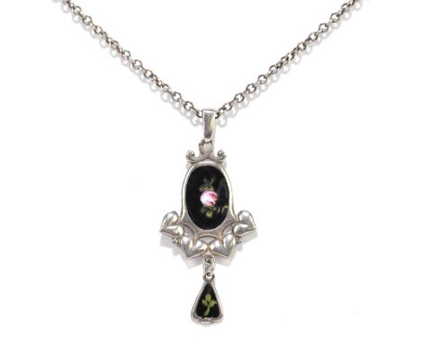CHARLES HORNER; a George V hallmarked silver and painted black enamel decorated pendant, the pierced frame with four stylised