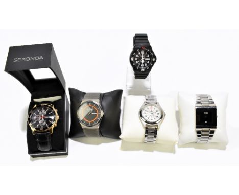 A collection of five gentleman's wristwatches comprising a Casio quartz watch with sports strap, a Skagen Danish stainless st