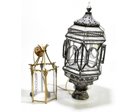 A reproduction silvered metal and glass hall lantern, height 60cm and a modern brass and glass hexagonal shaped lantern (2).
