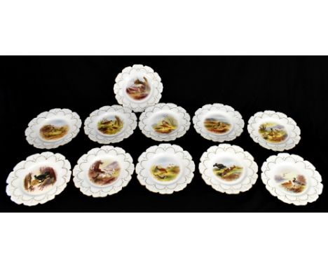 ROYAL WORCESTER VITREOUS; an eleven piece part dessert service signed by Johnson, each with painted centres depicting various