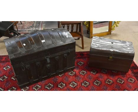 A brass and wood bound dome top travelling trunk, width 81cm, depth 45cm, height 54cm, together with a tin trunk, (2).