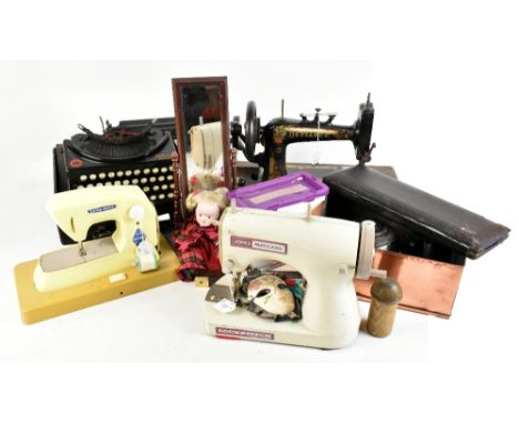 REMINGTON; a portable typewriter and a Defence manual sewing machine, two children's sewing machines including a Meccano exam