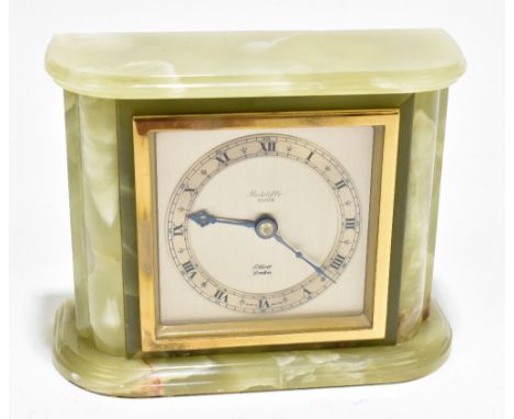 ELLIOT; a mid-20th century onyx mantel clock, the silvered plate with applied chapter ring bearing Roman and Arabic numerals,
