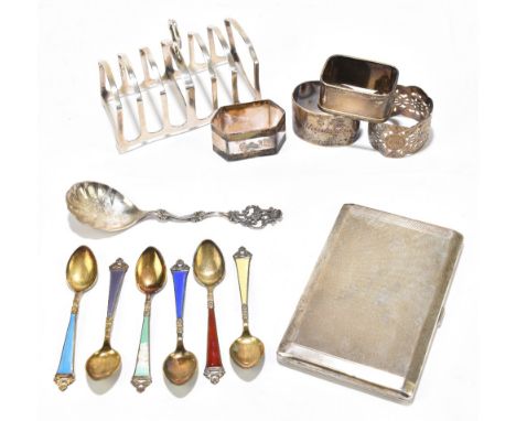 A George V hallmarked silver toast rack, Birmingham 1926, width 10.5cm, four hallmarked silver napkin rings, and a cigarette 