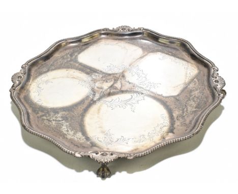 FRANK COBB &amp; Co; a George VI hallmarked silver salver of shaped circula form with cast beaded rim outside chased decorati