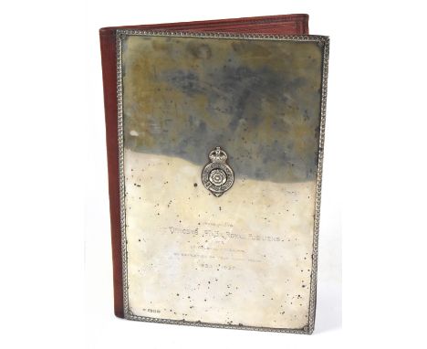 WWII ESPIONAGE INTEREST; a hallmarked silver mounted leather document wallet with regimental crest above inscription 'Present