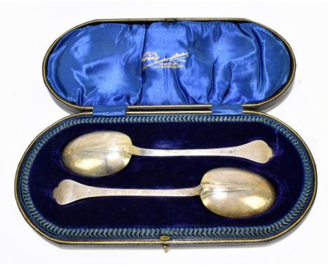JOHN ROUND; a pair of George V hallmarked silver trefid spoons, Sheffield 1911, approx weight 3.88ozt/120g, cased.Additional 