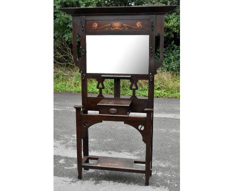 An Art Nouveau inlaid and stained wood hall stand, with mirror back above a shelf and a drawer, height 204cmAdditional Inform